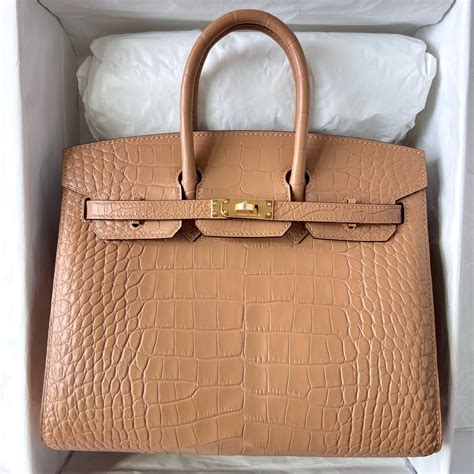 hermes constance to go gold|hermes constance crocodile.